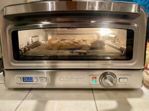 Four à pizza Cuisinart CPZ120E en action © Labo Maison