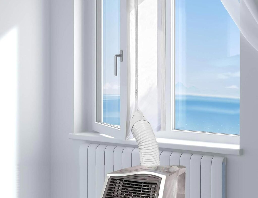  Climatiseur mobile avec kit de calfeutrage installé sur une fenêtre