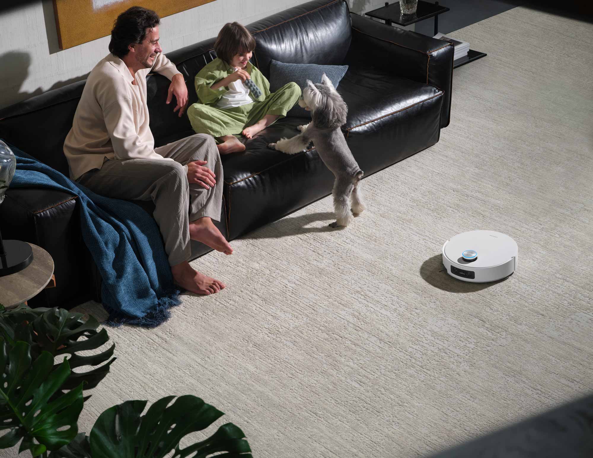 Le robot aspire un tapis en profondeur