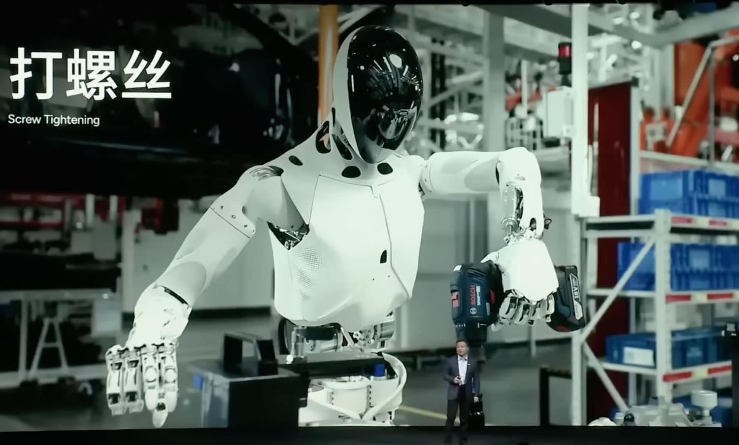 Robot humanoïde XPeng IRON travaillant dans une usine avec une perceuse à la main