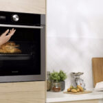 Appareil électroménager Brandt dans une cuisine, illustration des conséquences de la liquidation sur les garanties et le SAV