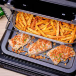 Aliments dorés et croustillants cuits dans le Moulinex Easy Fry 20L grâce à la technologie Extra Crisp