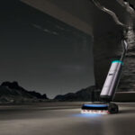 Aspirateur laveur Dreame H16 Pro Steam en utilisation sur un sol dur, avec sa tête vapeur et son design haut de gamme.