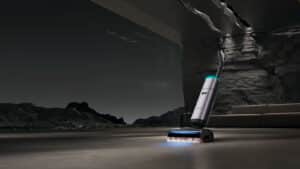 Aspirateur laveur Dreame H16 Pro Steam en utilisation sur un sol dur, avec sa tête vapeur et son design haut de gamme.