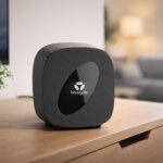 Box Bouygues B&You Pure Fibre WiFi 7 posée sur un meuble de salon