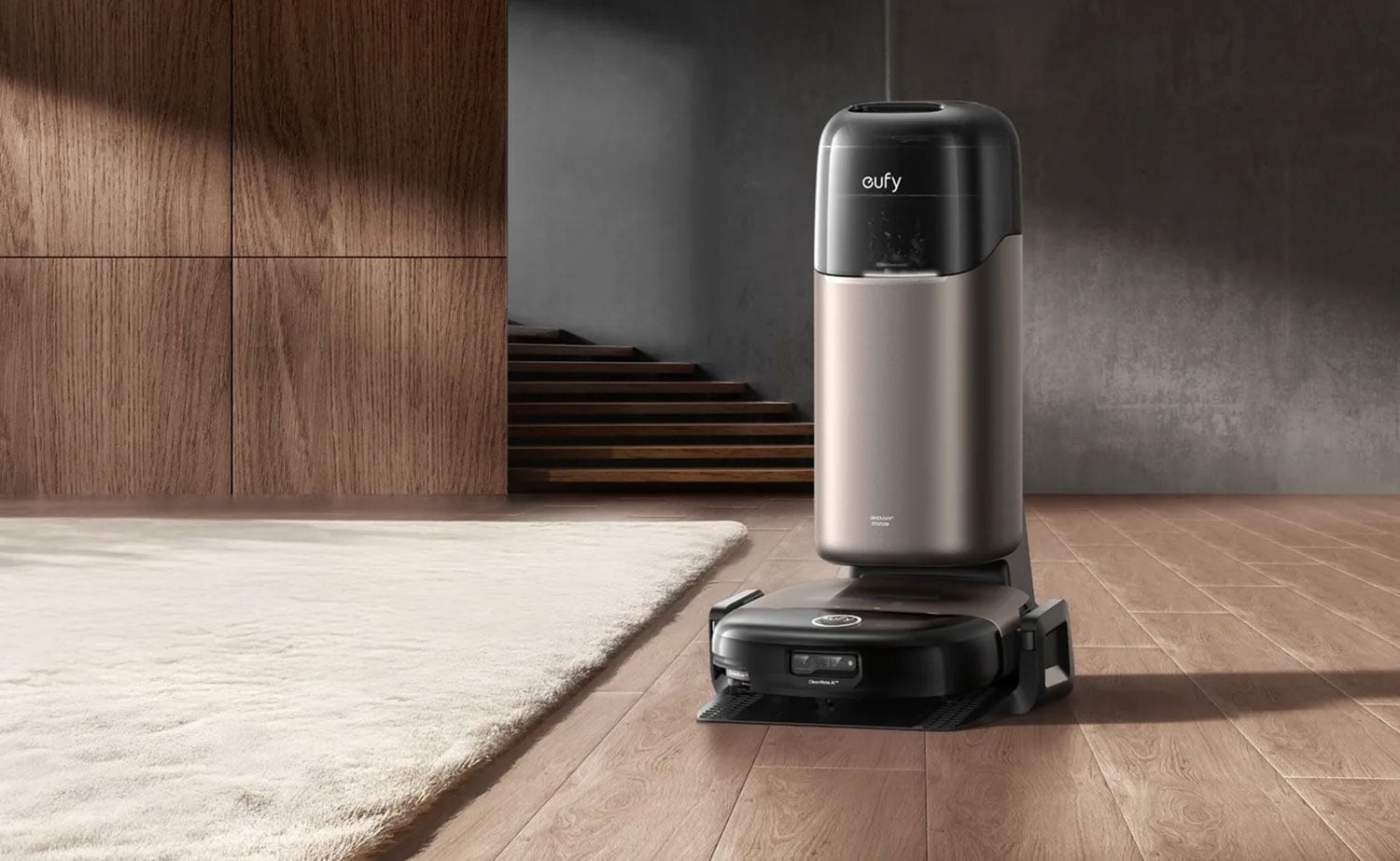 Station UniClean 12‑en‑1 du Eufy Omni S2, avec ses réservoirs d’eau propre et d’eau sale, son compartiment à sac à poussière et la zone d’accueil du robot