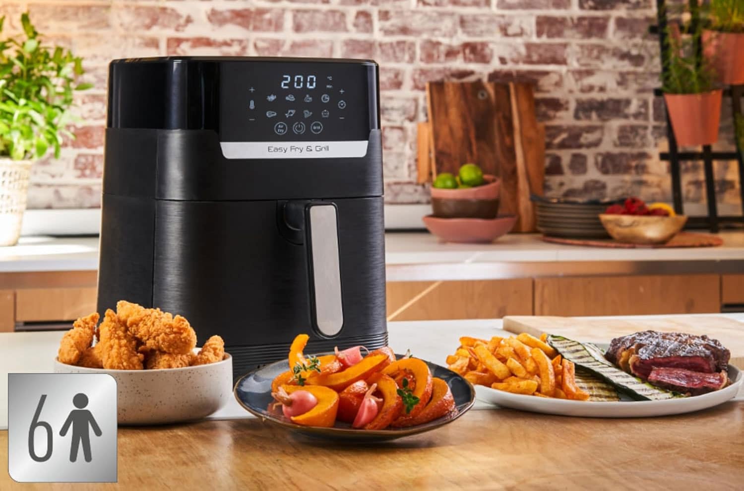 Moulinex Easy Fry & Grill 2‑en‑1 en promo à 59,99 €, avec panier de frites et plaque gril visibles sur un plan de travail