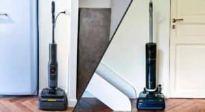 Deux aspirateurs laveurs de sol premium posés côte à côte sur un sol en parquet : le Roborock F25 Ultra à gauche et le Dreame H15 Pro Heat à droite.