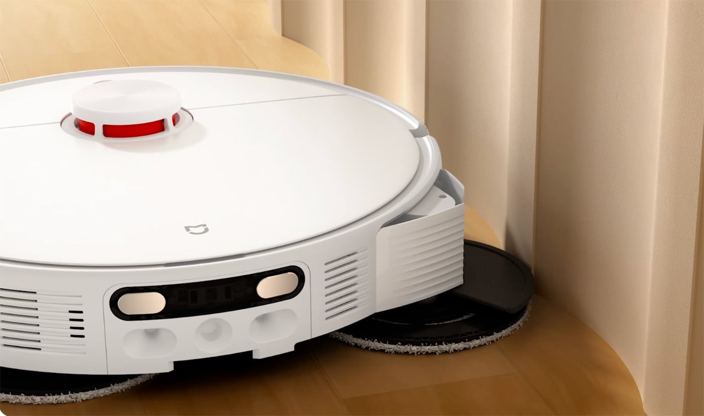Aspirateur robot laveur de sols Xiaomi H50 Pro. Le robot s'adapte en temps réel aux contours des obstacles, aux murs incurvés et aux plinthes irrégulières pour un nettoyage efficace sans blocage.