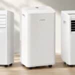 Trois climatiseurs mobiles Bosch, Kumtel et Olimpia Splendid alignés dans salon