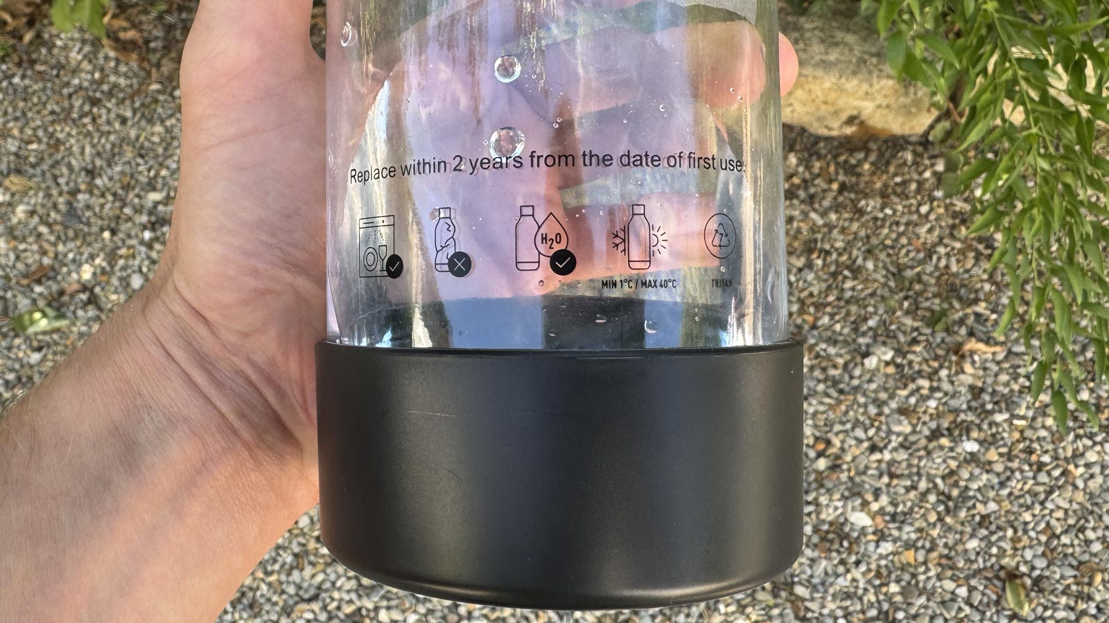 Mentions de température et d'entretien inscrites sur la bouteille Silvercrest