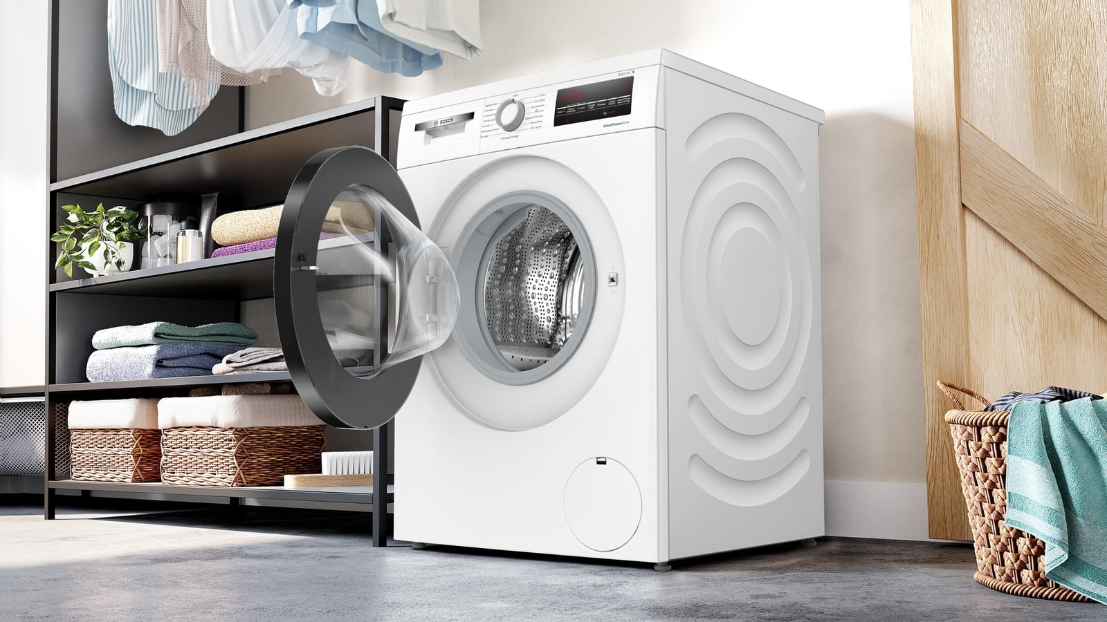 Lave-linge Bosch WUU28T18FR hublot ouvert dans une buanderie