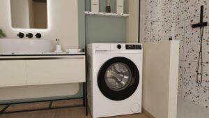 Lave-linge Candy ProWash 300 GD 410B8-S installé dans une salle de bain