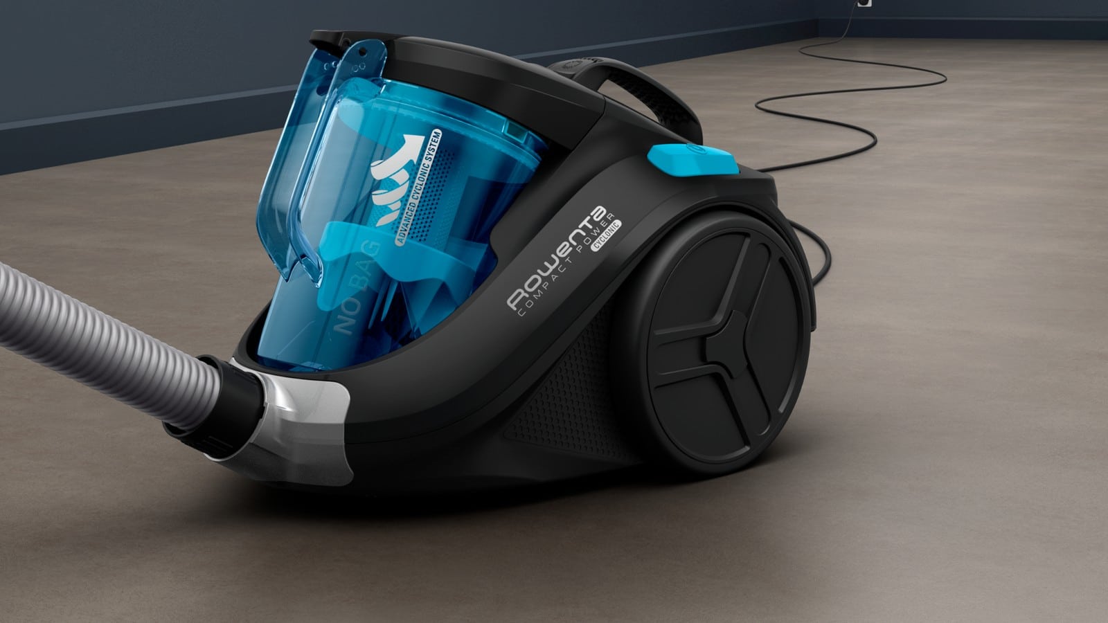 Aspirateur Rowenta Compact Power Cyclonic RO3731EA noir et turquoise posé au sol